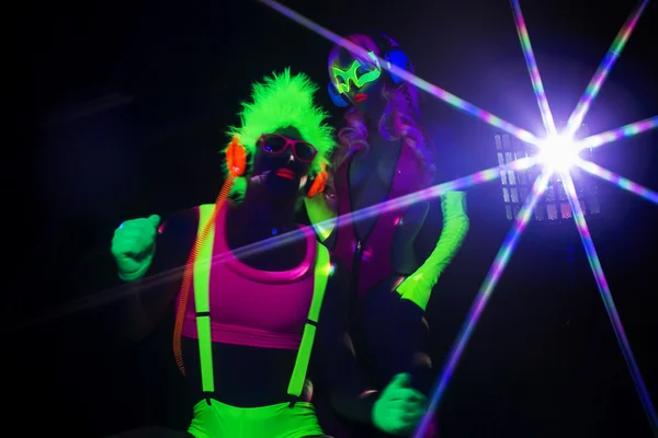 Sexy neon poświata para party — Zdjęcie stockowe