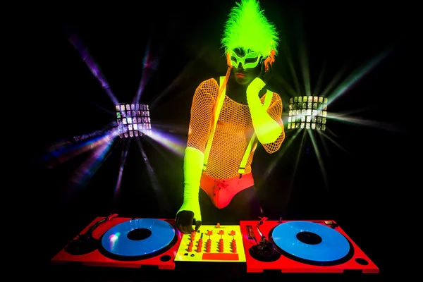 Sexy neon dj glow man turntables — Stock Photo, Image