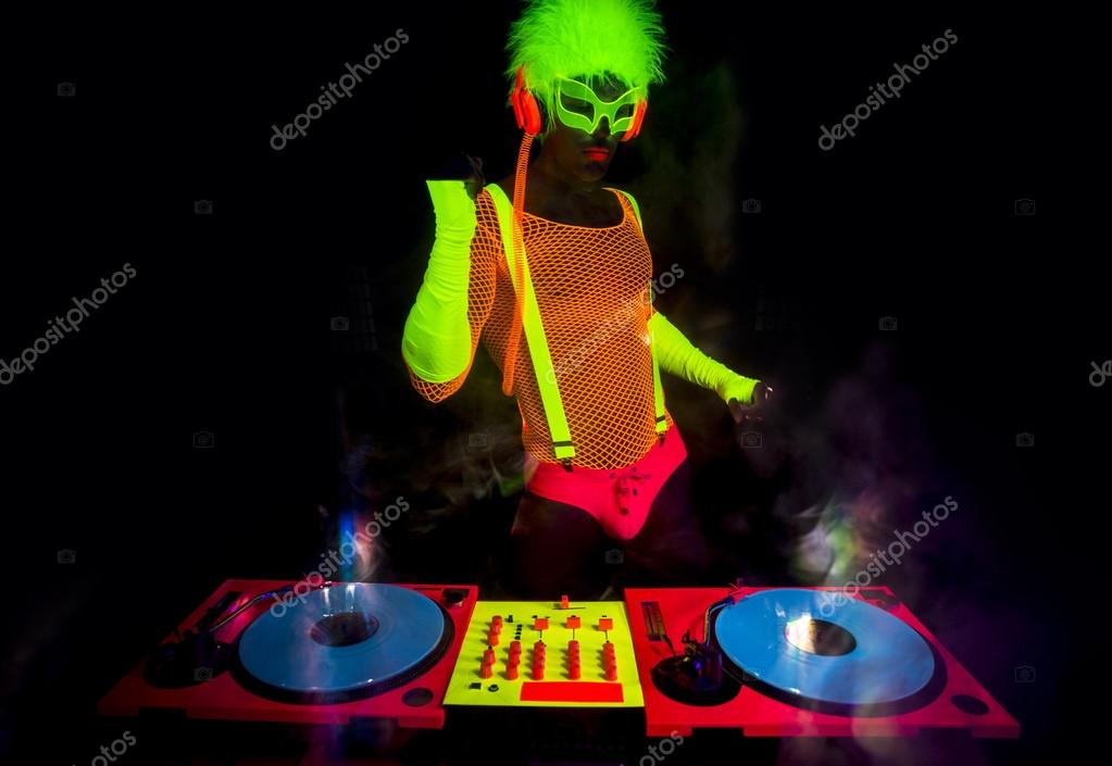 sexy neon dj glow man turntables — Stock Photo © dubassy 115407140