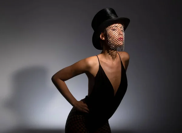 Young woman wearing top hat with sparkly veil and black body — Stock Photo, Image