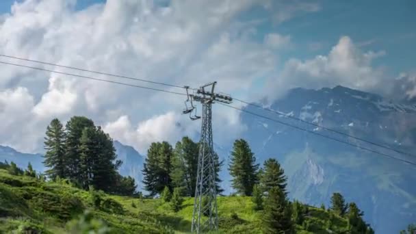 Loopable cinemagraph of swiss mountains and ski lift — Stock Video