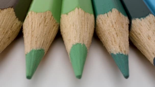 Coloured pencils in a row — Stock Video