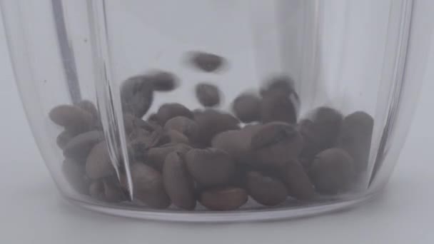 Falling coffee beans, slow motion — Stock Video