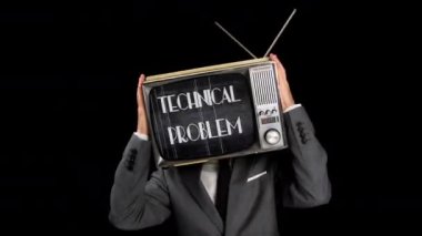 Kafasında TV olan takım elbiseli bir adam.