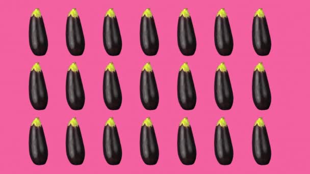 Rijen aubergines geanimeerd tegen gekleurde achtergrond — Stockvideo