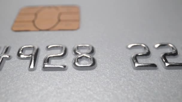 Close-up macro van nummers op kredietkaart — Stockvideo