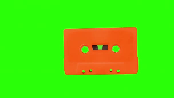 Cassetteband beweegt zich tegen groen scherm — Stockvideo