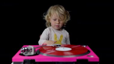 Loopable Djing small girl on turntables