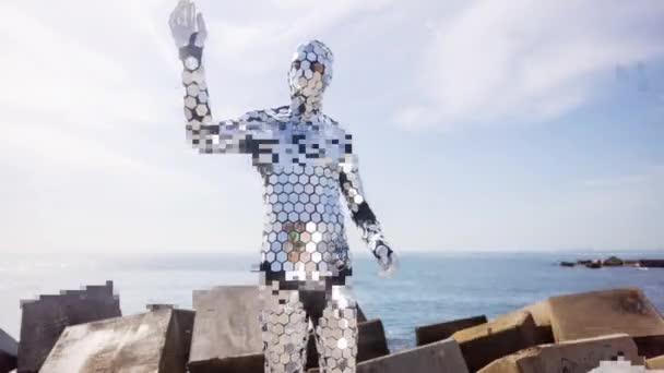 Sparkling discosuit man dancing next to the sea — Stock Video