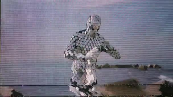 Sparkling discosuit man dancing next to the sea — Stock Video