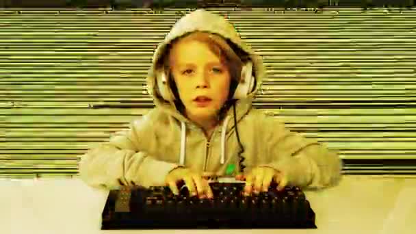 Young boy typing on keyboard — Stock Video