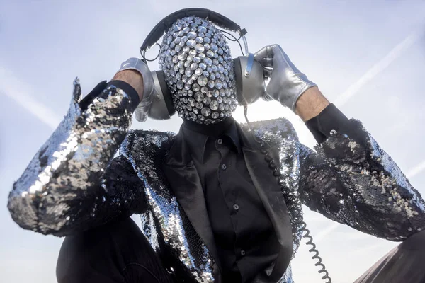 Mr disco man with sparkly face and headphones — Stock Photo, Image
