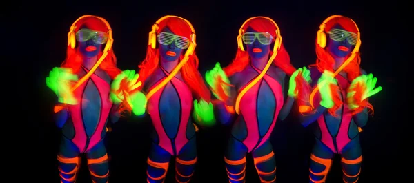 Sexy neon UV-gloed danser — Stockfoto