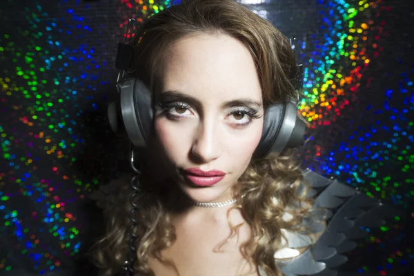 Beautiful sexy disco dj woman in silver costume — Stock Photo, Image