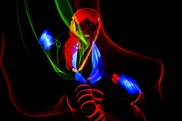 Sexy neon UV-gloed danser — Stockfoto