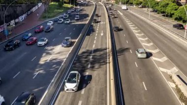 timelapse of traffic on a highway in barcelona during evening rush hour