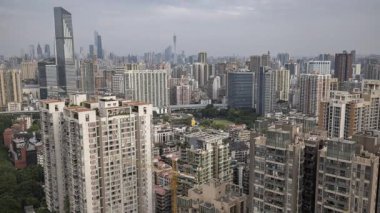 Guangzhou 'nun muhteşem gökdelen gökdeleninin zaman ayarlı görüntüsü, çok yüksek bir bakış açısından Çin
