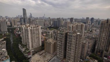 Guangzhou 'nun muhteşem gökdelen gökdeleninin zaman ayarlı görüntüsü, çok yüksek bir bakış açısından Çin