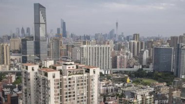 Guangzhou 'nun muhteşem gökdelen gökdeleninin zaman ayarlı görüntüsü, çok yüksek bir bakış açısından Çin