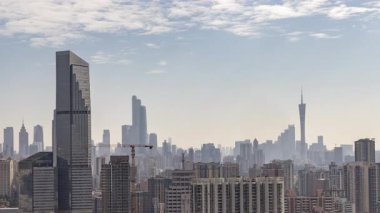 Guangzhou 'nun muhteşem gökdelen gökdeleninin zaman ayarlı görüntüsü, çok yüksek bir bakış açısından Çin