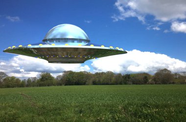 Yeşil alan üzerinde uçan UFO