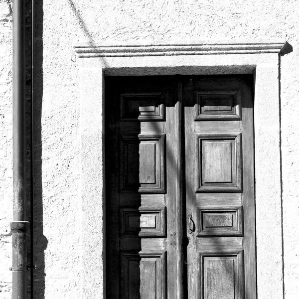 Detail in muur deur Italië land Europa architectuur en hout th — Stockfoto