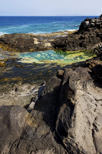 Kusten i lanzarote Spanien cloud stranden vatten mysk och summan — Stockfoto