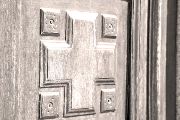 Texture of a brown old door in italy europe — Stock Photo, Image