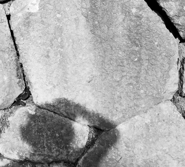 Pavo y ladrillo escalonado agrietado en materia de textura de pared vieja — Foto de Stock