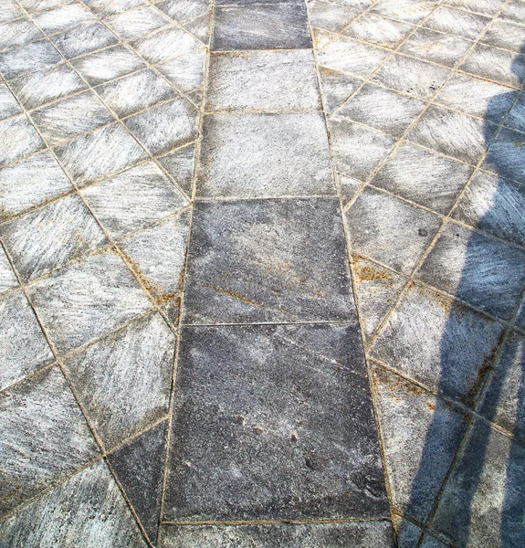 Brick in casorate sempione street ll pavement of a curch and mar — Stock Photo, Image