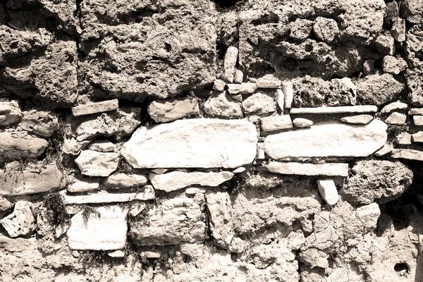 Pavo y ladrillo escalonado agrietado en materia de textura de pared vieja — Foto de Stock