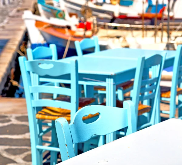 Tabulka v Evropě santorini Řecko staré restauraci křeslo a su — Stock fotografie