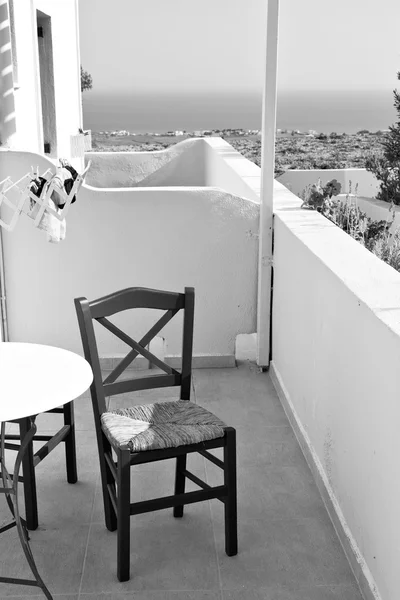 Sofá de mimbre en santorini europe griego viejo restaurante silla y — Foto de Stock