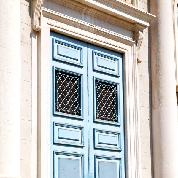 Detail in  wall door  italy land europe architecture and wood th — Stock Photo, Image