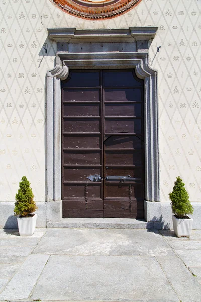 Door   in italy  lombardy   column plant vase — Stock Photo, Image