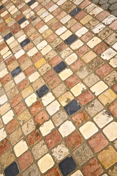 Na rua de borghi pavimento abstrato de um cofrinho e mármore — Fotografia de Stock