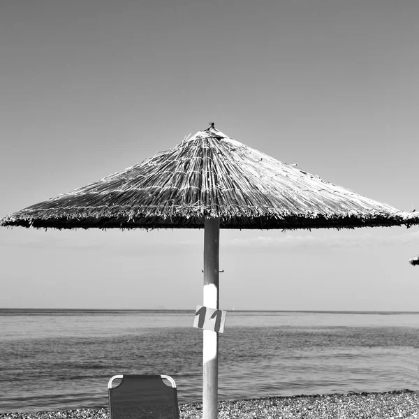 Rock sea     and     beach   in  europe greece the mykonos islan — Stock Photo, Image