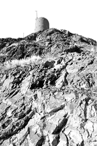 In oman muscat rock  the old defensive  fort battlesment sky and — Stock Photo, Image