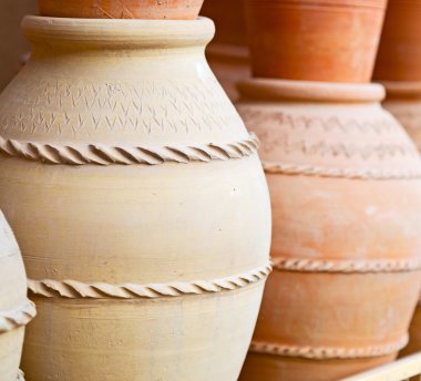in oman     muscat the old pottery    market sale manufacturing  clipart