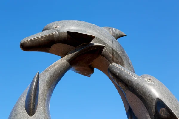 En oman antigua estatua de delfín — Foto de Stock