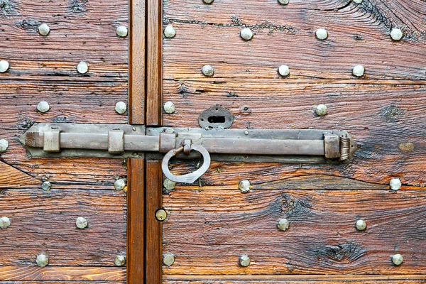 Italy  patch lombardy    cross  r in a  door curch  wood — Stock Photo, Image