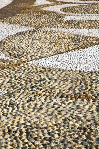 Near parabiago street   italy      pavement of a curch and wall — Stock Photo, Image