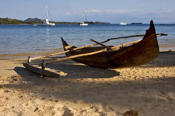 Madagascar nosy be rock stone branch yacht boat palm lagoon and — Stock Photo, Image