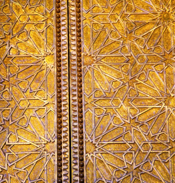 Metal cinzento morocco enferrujado em ouro africano — Fotografia de Stock