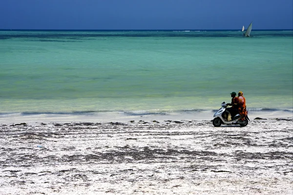 Scooter in the beach of zanzibar — Stock Photo, Image