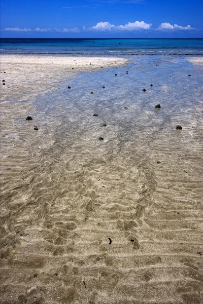 Kleiner Felsen am Strand von Andilana — Stockfoto