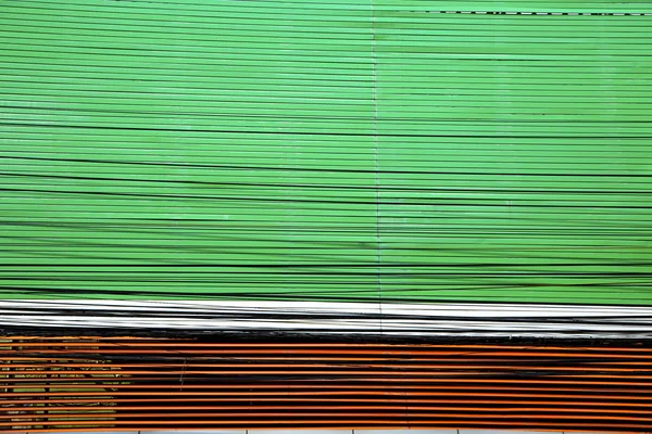 Мбаппе в зеленом металле — стоковое фото