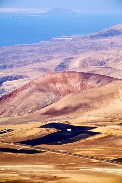 Skały kamień wody w krajobraz wyspy lanzarote Hiszpania — Zdjęcie stockowe