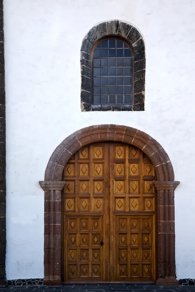 Lanzarote  spain canarias brass brown knocker  and white wall ab — Stock Photo, Image