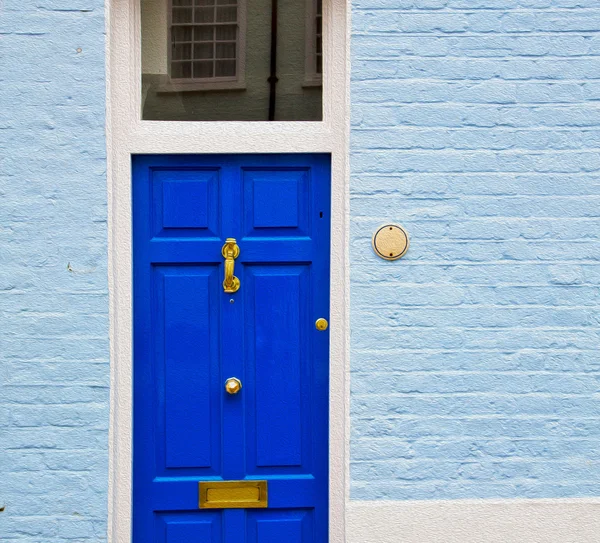 Notting hill in london england olod suburban and antique wall do — Stock Photo, Image